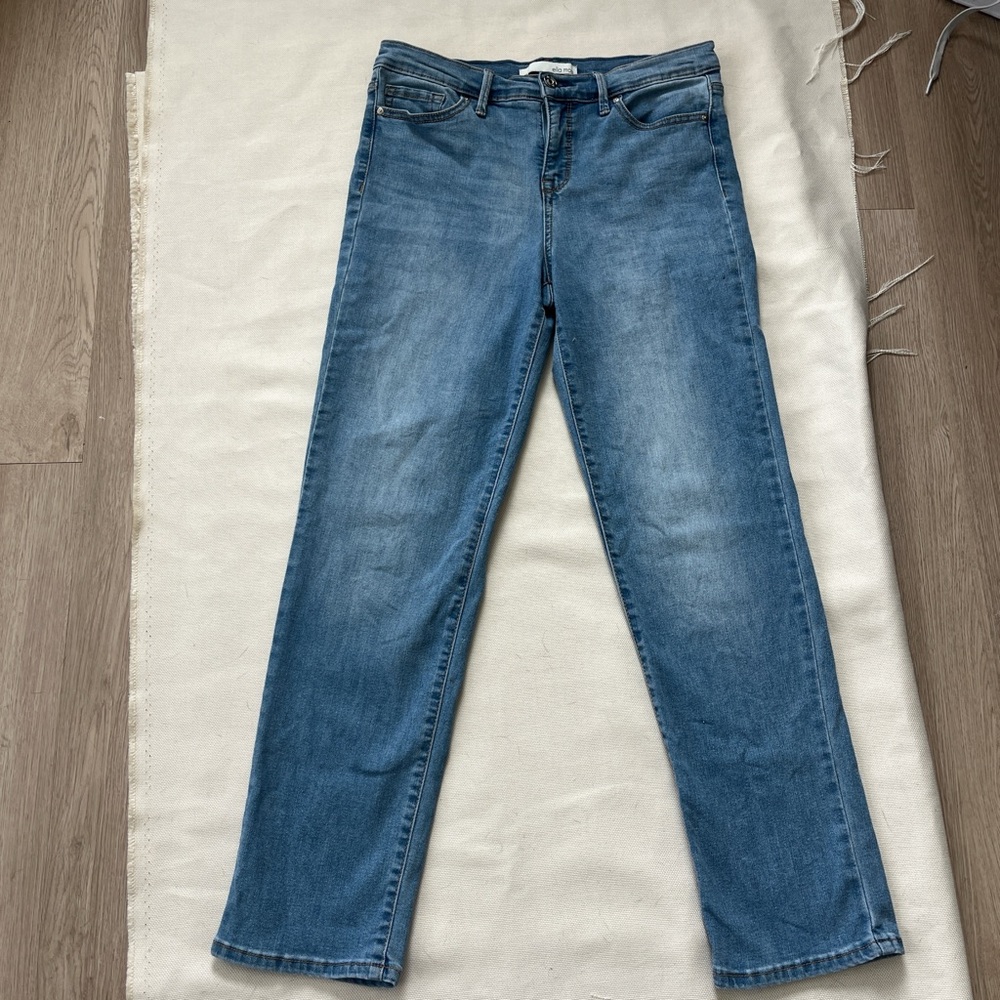 Women's Light Wash Mid-Rise Ella Moss Straight Jeans.
